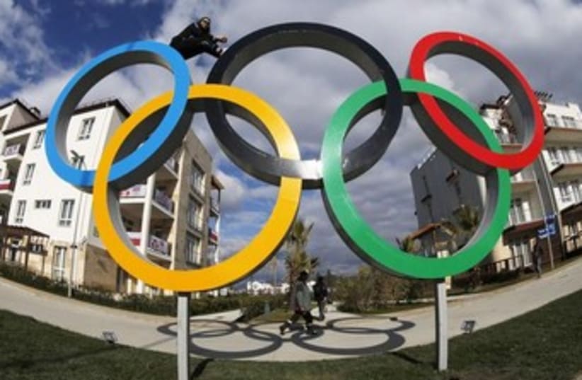  Olympic rings in the Coastal Athlete's Village in Sochi, February 4, 2014 (photo credit: REUTERS)