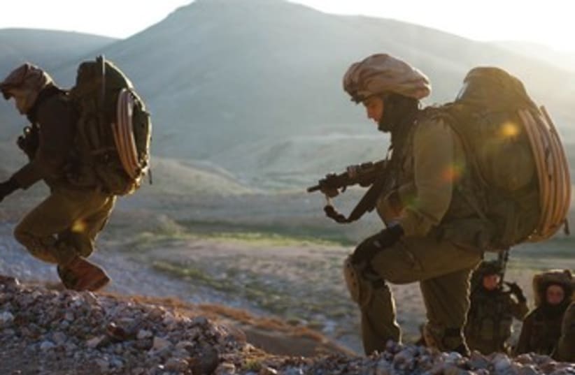 SOLDIERS FROM the Nahal Reconnaisance Battalion take part in exercices concluding an eight-month advanced training course. (photo credit: COURTESY IDF SPOKESMAN'S OFFICE)