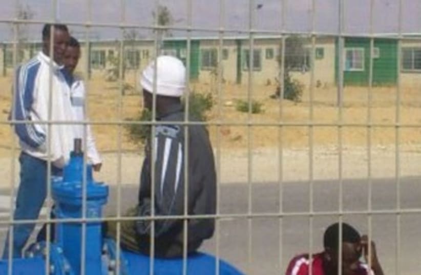 DETAINEES PASS the time  at the Holot detention facility in the western Negev. (photo credit: BEN HARTMAN)
