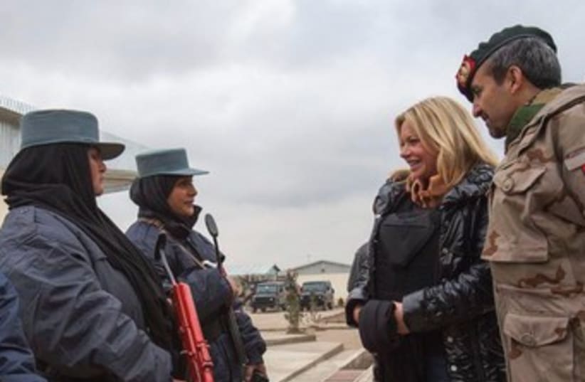Dutch Defense Minister Jeanine Hennis-Plasschaert visits Afghan soldiers (photo credit: REUTERS)