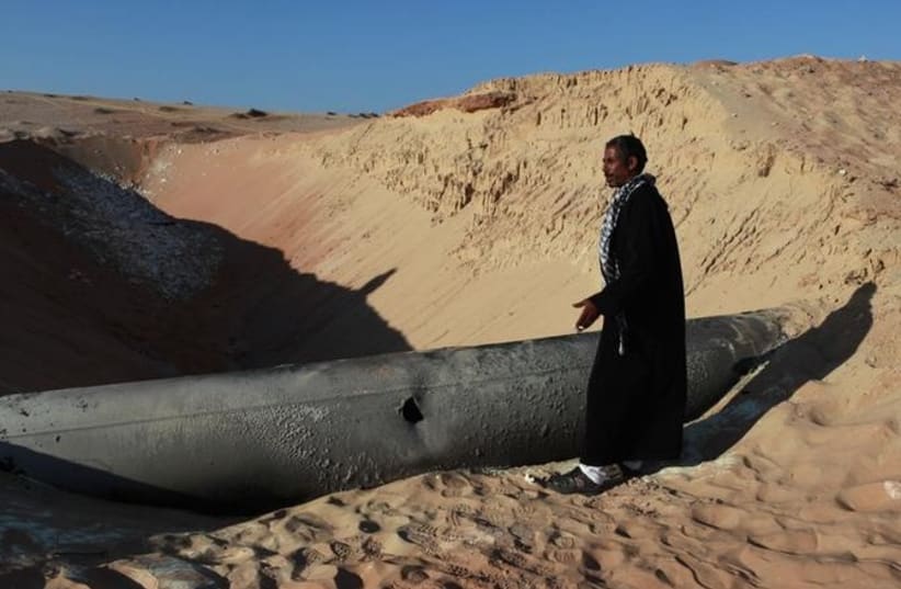 Egyptian gas pipeline carrying gas to Israel and Jordan hit by a RPG, March 6, 2012. (photo credit: REUTERS)
