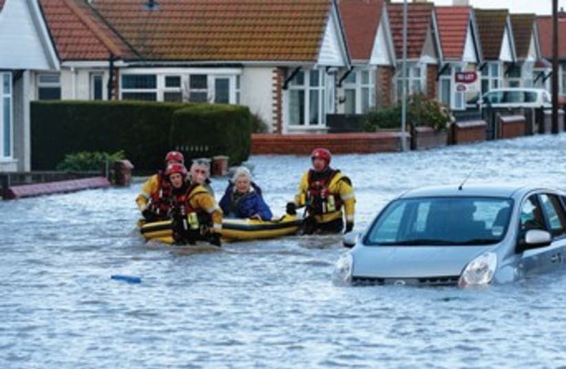 Flooding in England (photo credit: REUTERS)