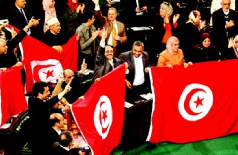 Parlement tunisien lors de l'adoption de la Constitution (photo credit: REUTERS)