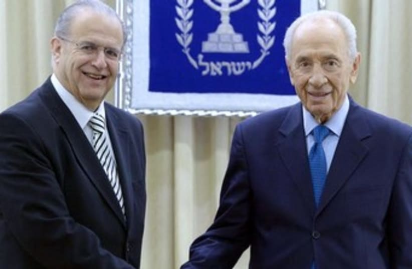 President Shimon Peres with Cypriot FM Ioannis Kasoulide. (photo credit: Mark Neiman/GPO)