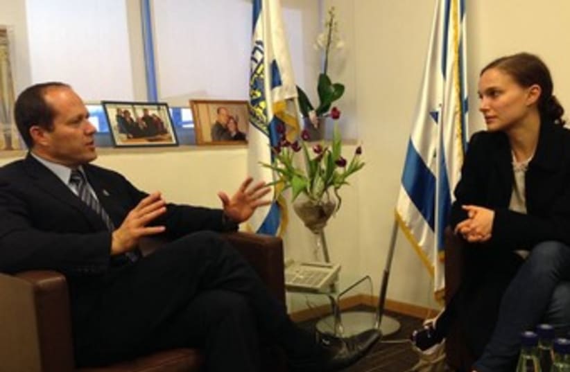 JERUSALEM MAYOR Nir Barkat speaks with Oscar-winning actress Natalie Portman in his Jerusalem office.  (photo credit: Courtesy)