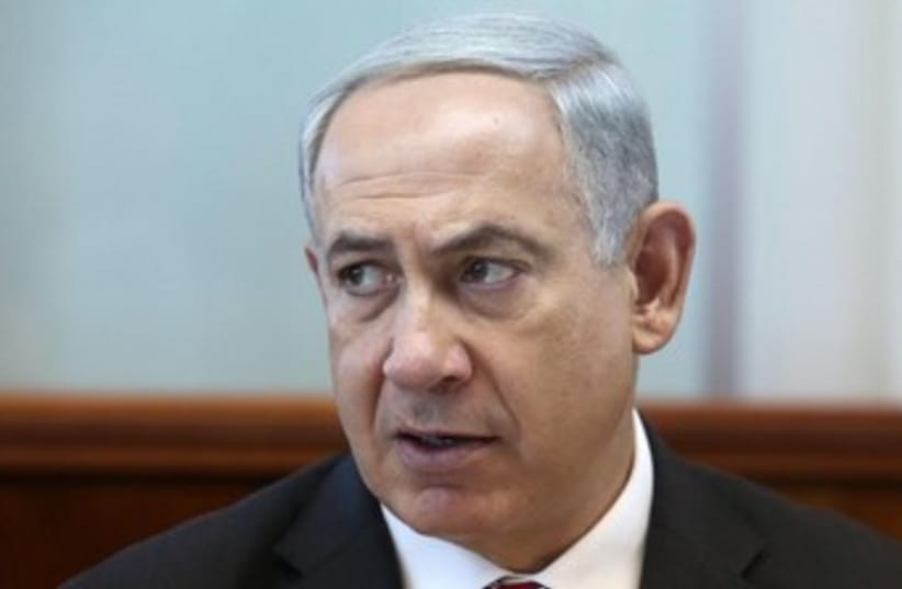 Netanyahu arrives at weekly cabinet meeting (photo credit: MARC ISRAEL SELLEM/THE JERUSALEM POST)