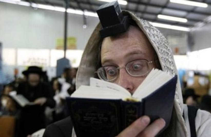 An Orthodox Jew prays in the Ukrainian town of Uman. (photo credit: REUTERS)