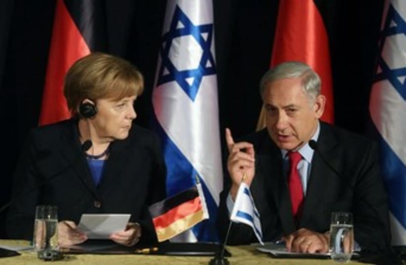 Prime Minister Binyamin Netanyahu and German Chancellor Angela Merkel in Jerusalem, February 25, 2014. (photo credit: MARC ISRAEL SELLEM)