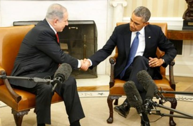 Netanyahu and Obama shake hands at start of Oval Office meeting, March 3, 2013 (photo credit: REUTERS)