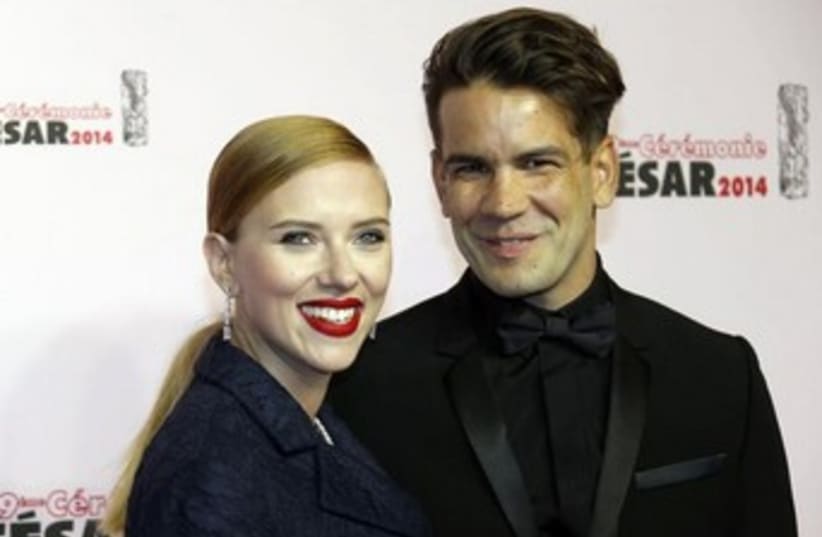 Scarlett Johansson and her fiancé Romain Dauriac. (photo credit: REUTERS)