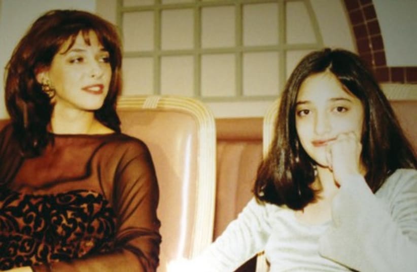 The writer at her Bat Mitzva with her mom, 'Defense News' reporter Barbara Opall-Rome (photo credit: Courtesy)