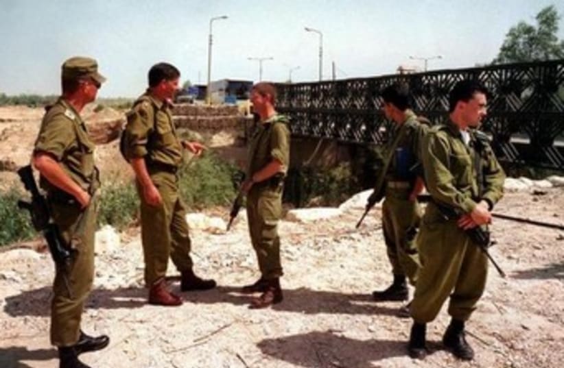 IDF soldiers at the Allenby Bridge crossing near the border with Jordan. (photo credit: REUTERS)