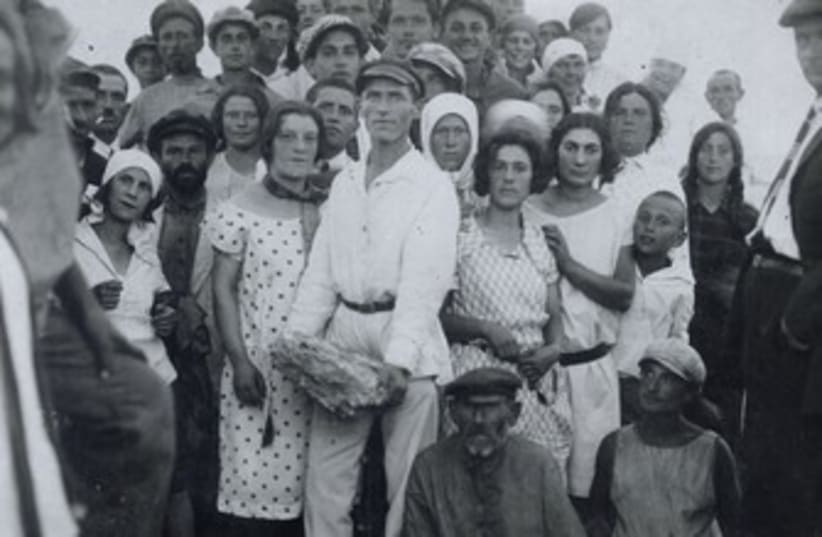 Jewish farmers from a Crimean collective celebrate the cornerstone laying for a new school in 1927  (photo credit: AMERICAN JEWISH JOINT DISTRIBUTION COMMITTEE ARCHIVES/ JTA)