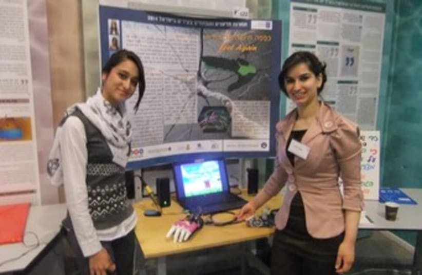 Two girls from Baka el-Garbia present their research (photo credit: JUDY SIEGEL-ITZKOVICH)