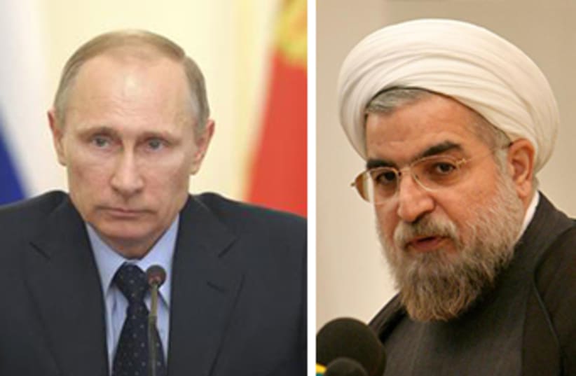 Putin and Rouhani at Bushehr (photo credit: REUTERS)