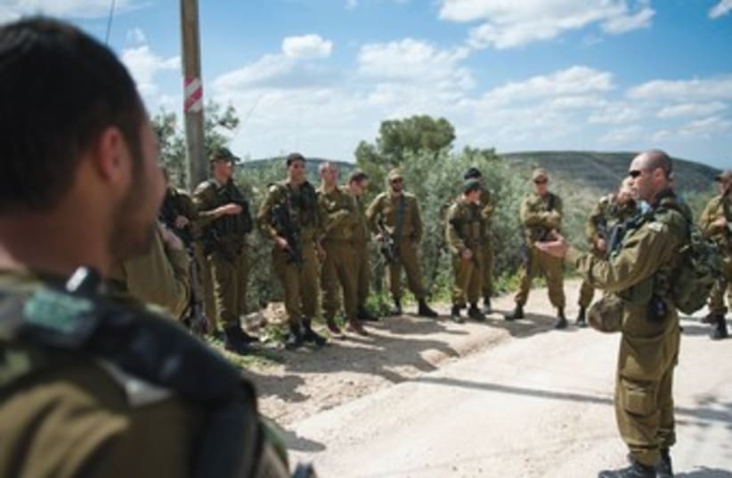 COMMANDER OF the 7th Brigade’s 77th Armored Battalion Lt.-Col. Yair Or addresses his officers near the West Bank village of Idna. (photo credit: COURTESY IDF SPOKESMAN'S OFFICE)