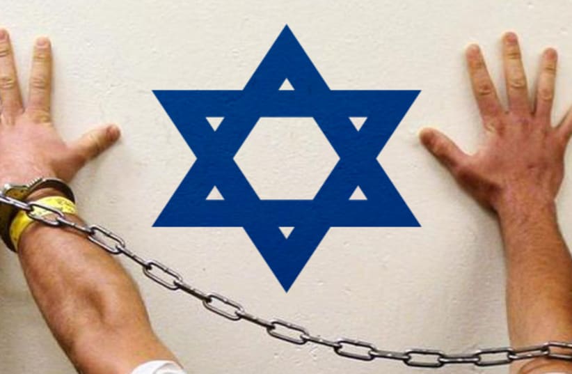 Man arrested for Israel ties [illustrative] (photo credit: REUTERS)