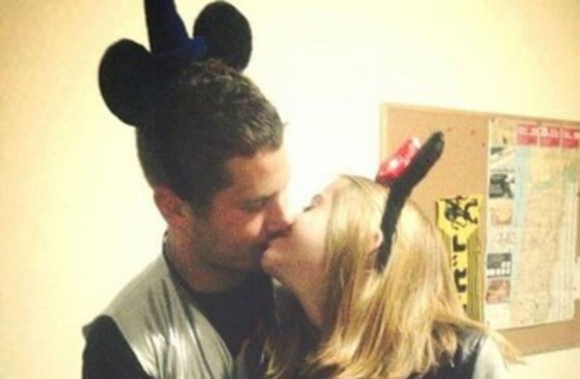 Avner Netanyahu, the son of Israel's prime minister, shares a Purim kiss with his girlfriend. (photo credit: FACEBOOK)