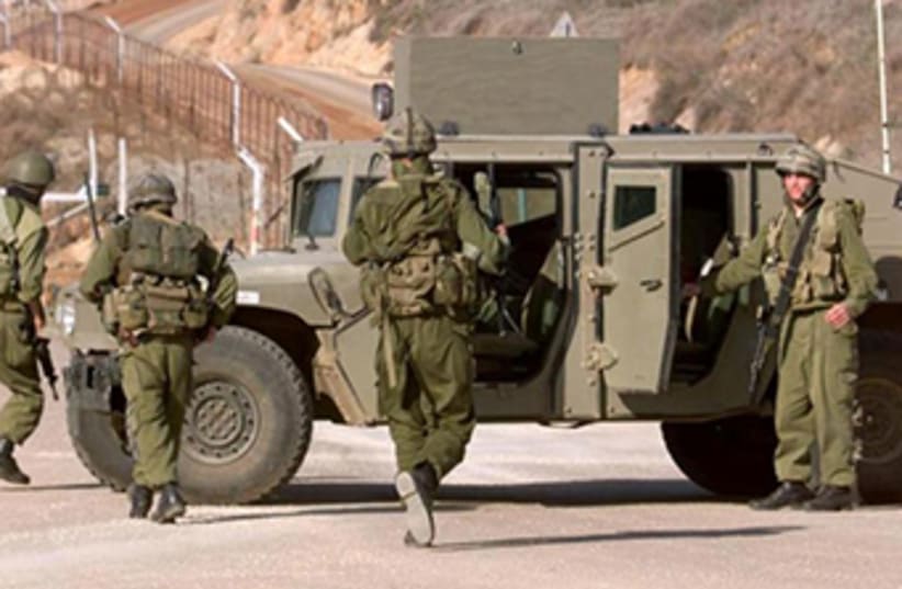 IDF jeep on northern border (photo credit: REUTERS)