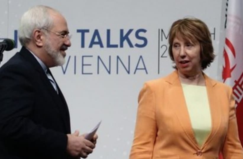 Iranian FM Mohammad Javad Zarif (L) and EE foreign policy chief Catherine Ashton at nuclear talks in Vienna March 19, 2014.  (photo credit: REUTERS)