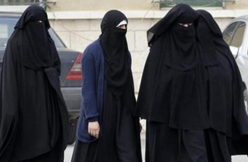 Jordanian women are seen with religious head-covering. (photo credit: REUTERS)