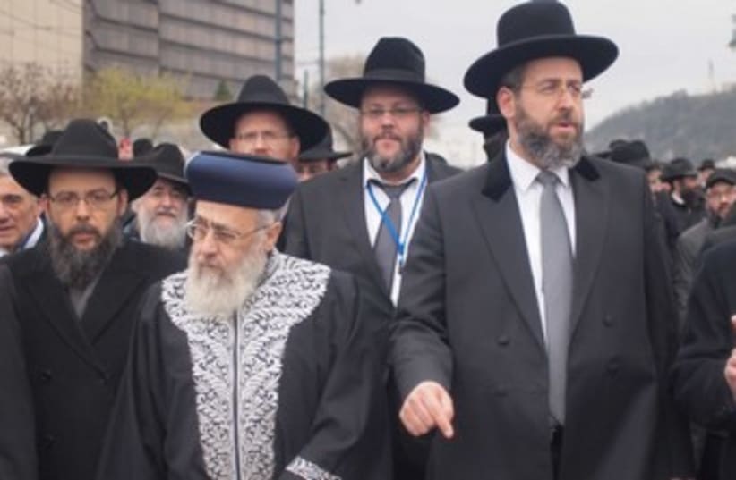 Israel's chief rabbis, Yitzhak Yosef (R) and David Lau, in Hungary to comemorate the 70th anniversary of the Holocaust. (photo credit: SAM SOKOL)