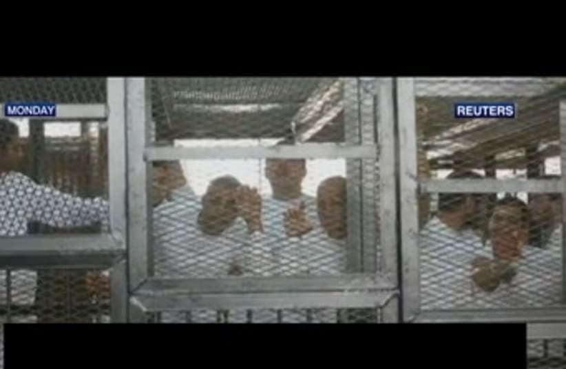 Muslim Brotherhood in court cages (photo credit: REUTERS)