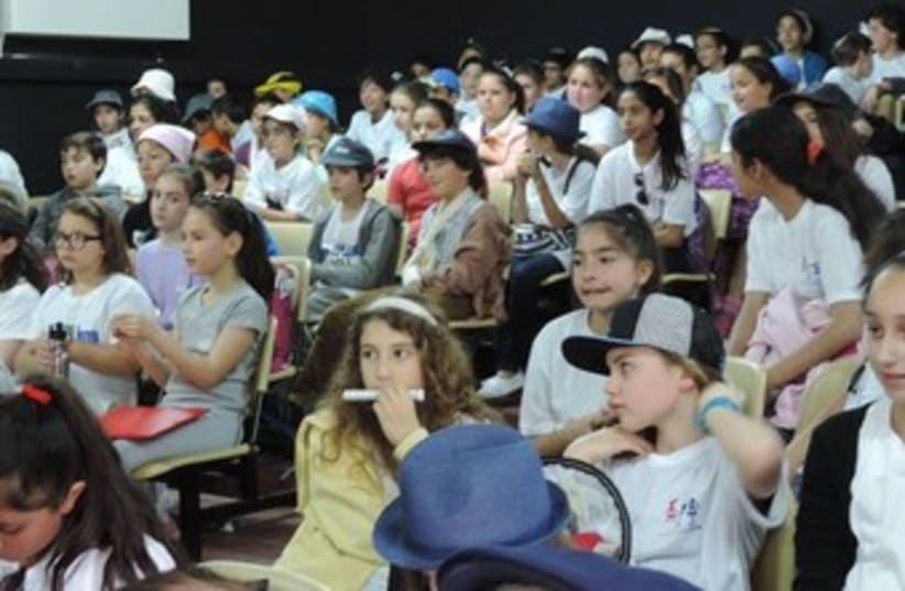 French and Swiss fourth grade students along with their Israeli counterparts at the Mikveh Israel School in Holon (photo credit: COURTESY KOL ISRAEL HAVERIM)