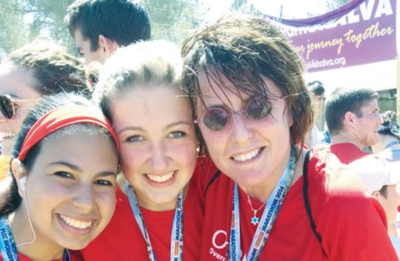 Kay Wilson (right) with members of the Team OneFamily at the Jerusalem Marathon. (photo credit: Courtesy)