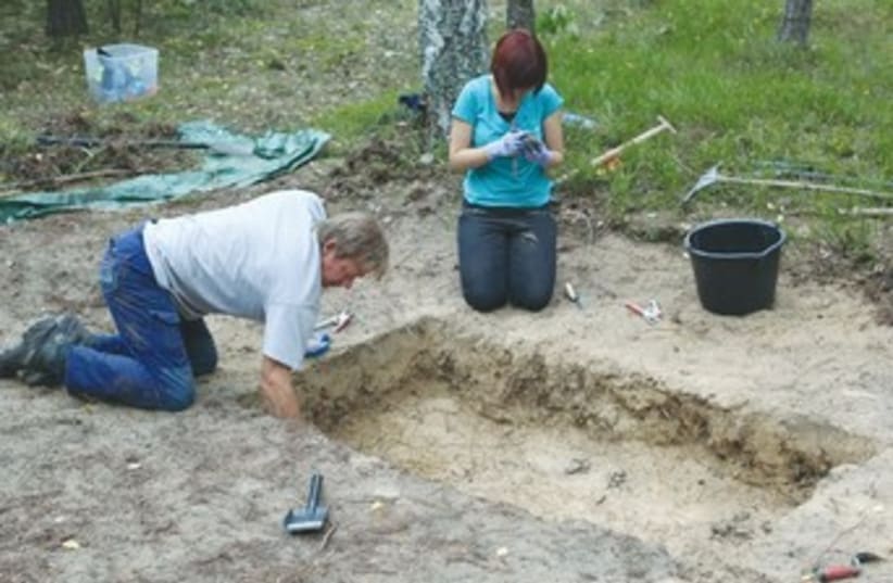 Forensic archeologists excavate the site of the Treblinka death camp in an effort to reconstruct it. (photo credit: REUTERS)