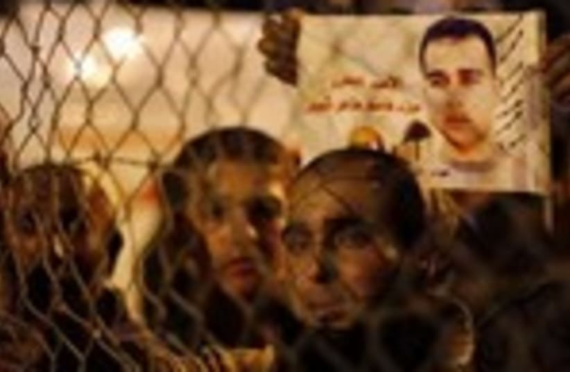 Palestinians celebrate prisoner release 390 (photo credit: REUTERS)