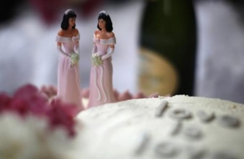 A wedding cake is seen at a reception for same-sex couples. (photo credit: REUTERS)