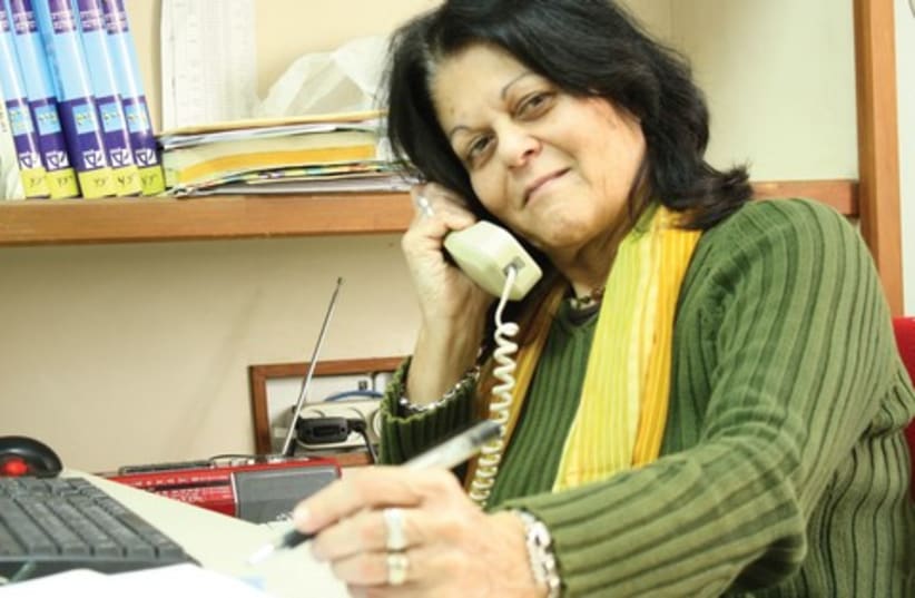 RUTH ALMAGOR-RAMON sits in her office at the Israel Broadcasting Authority. (photo credit: EHUD STAMLER)