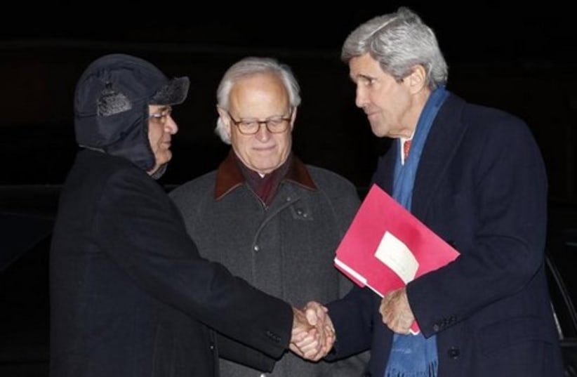 US Secretary of State Kerry (R), US envoy Martin Indyk (C) with PA chief negotiator Saeb Erekat (L), March 3, 2014. (photo credit: REUTERS)