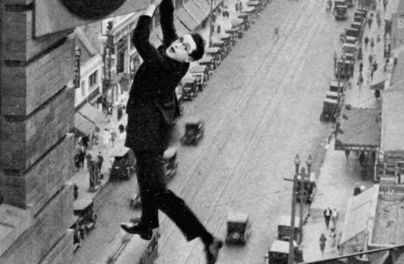 Harold Lloyd stars in the 1923 film, ‘Safety Last.’  (photo credit: Wikimedia Commons)