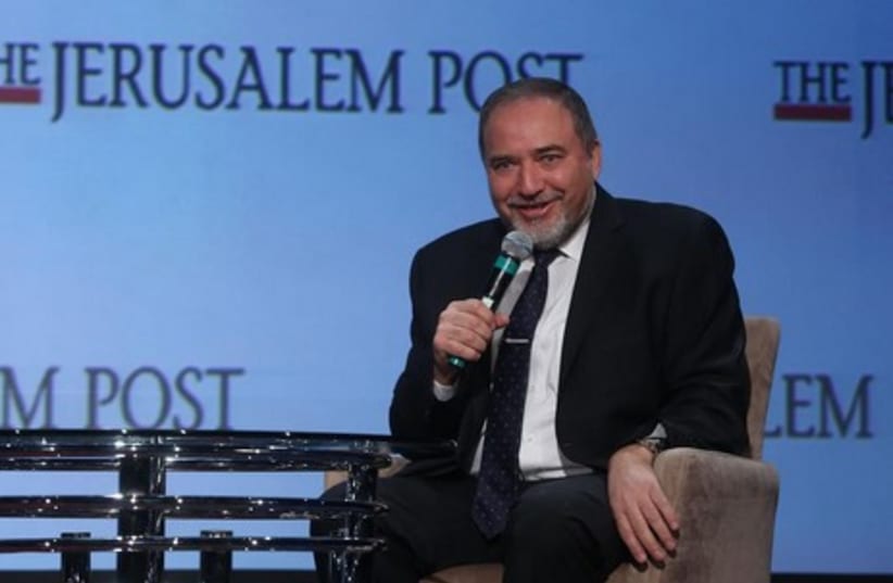Foreign Minister Avigdor Liberman speaks at the 2014 Jerusalem Post Annual Conference, April 6, 2014. (photo credit: MARC ISRAEL SELLEM/THE JERUSALEM POST)