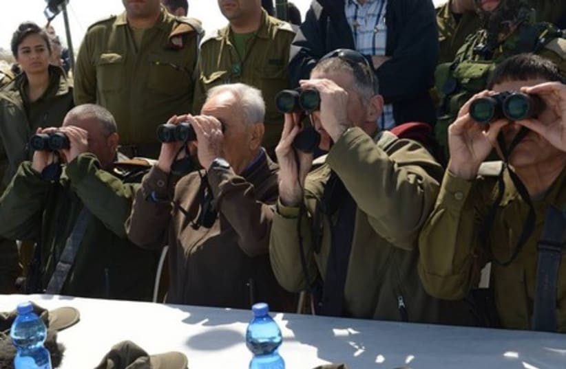 President Peres with soldiers on northern borde (photo credit: GPO)