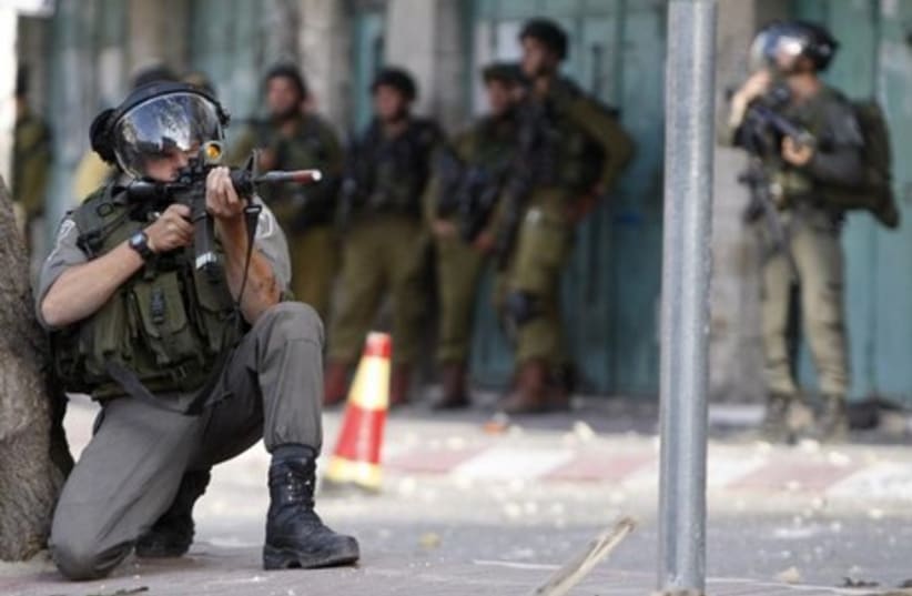IDF after passover attack (photo credit: REUTERS)