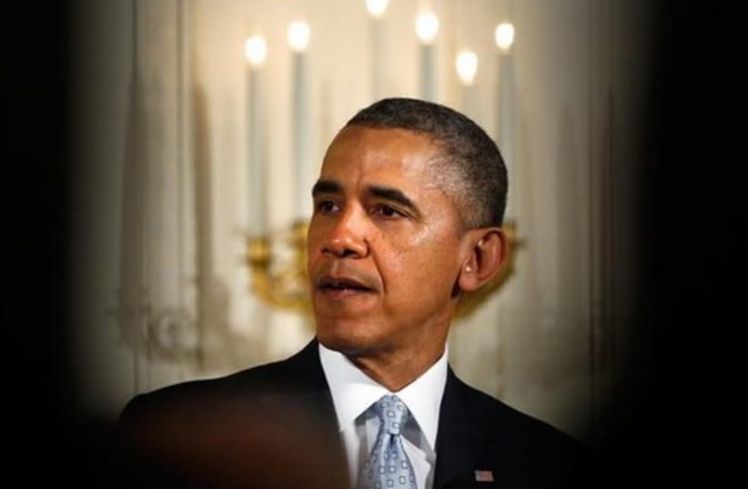 Obama on Passover (photo credit: REUTERS)