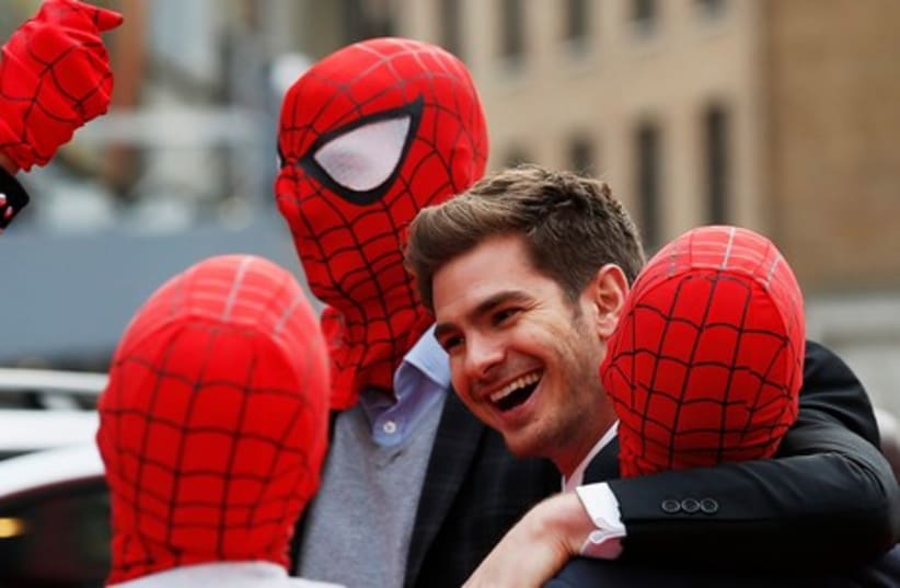 Andrew Garfield with Spidermen, April 10, 2014  (photo credit: REUTERS)
