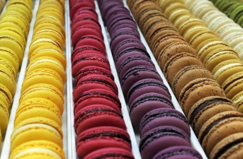 Rows of macaroons are seen at the Brussels Chocolate Festival (photo credit: REUTERS)