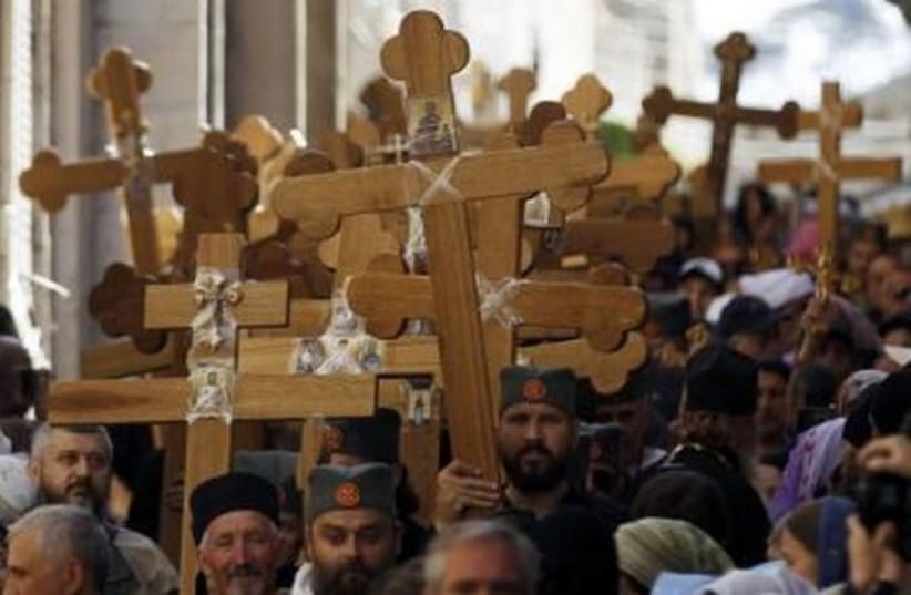Christian worshippers in a procession marking Good Friday in Jerusalem's Old City April 18, 2014. (photo credit: REUTERS)