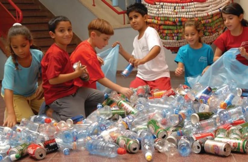 School children from Afek School in Rosh Ha'ayin sorting and recycling bottles. (photo credit: COURTESY AFEK SCHOOL ROSH HA'AYIN)