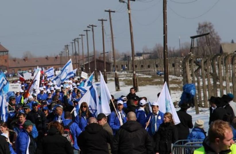 HUNDREDS OF high school students from across the globe march from Auschwitz to Birkenau last year in an annual event sponsored by International March of the Living. (photo credit: COURTESY OF BATIA DORI)