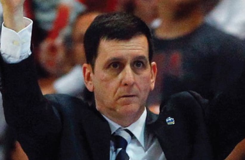 Bnei Herzliya coach Muli Katzurin breathed a huge sigh of relief last night after his team secured its BSL survival with an 80-79 victory over Hapoel Eilat. (photo credit: REUTERS)