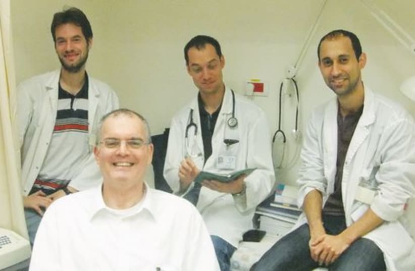 Dr. Yoav Lurie and young colleagues. (photo credit: JUDY SIEGEL-ITZKOVICH)