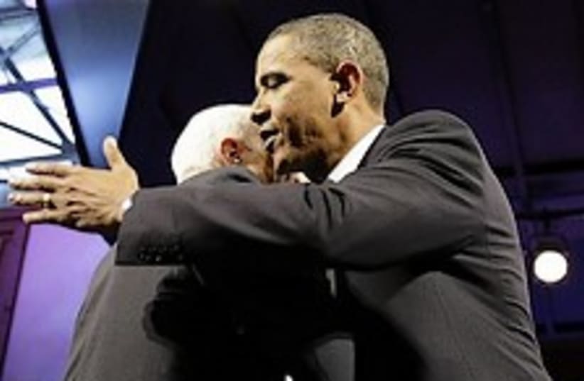 obama hugs mccain 224.88 ap (photo credit: AP)