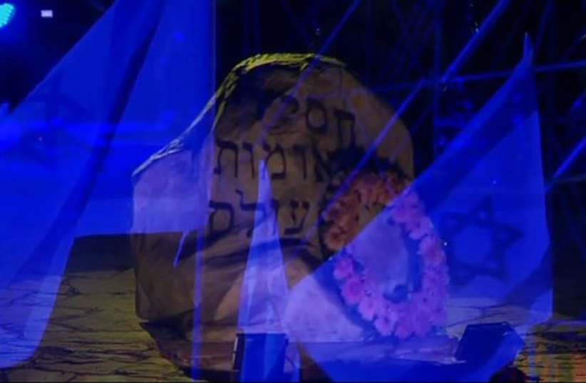 A memorial on the stage of the closing ceremonies of Holocaust Remembrance Day (photo credit: YOUTUBE SCREENSHOT)