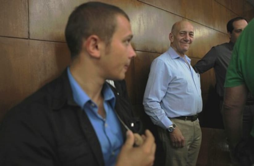 Former prime minister Ehud Olmert on the second day of sentencing hearings, April 29, 2014. (photo credit: DROR EYNAV/POOL)