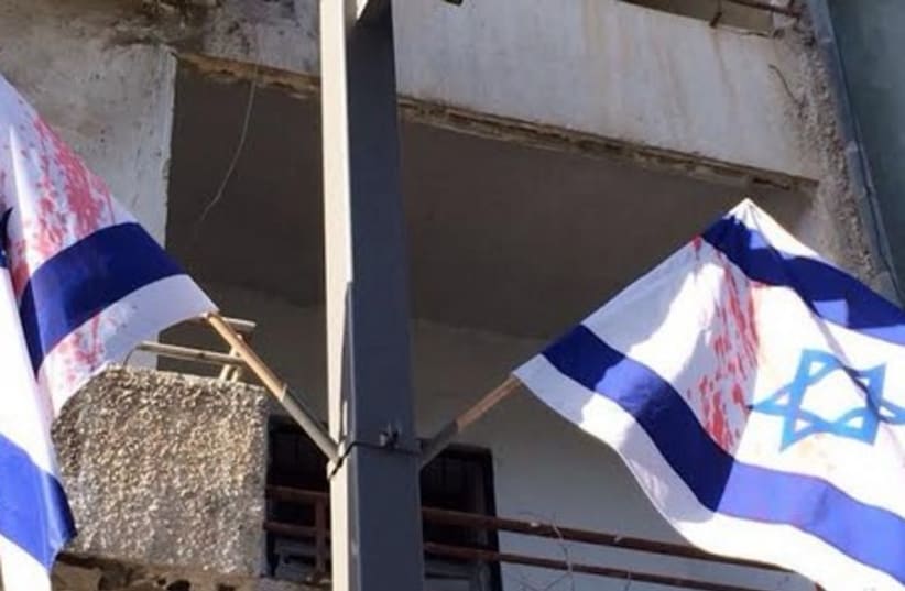 Israeli flags desecrated, May 1, 2014. (photo credit: ISRAEL POLICE)